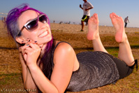 punk singer barefoot pose
